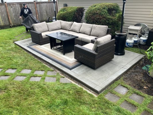 Patio repair - We removed existing pavers. Set forms. Compact gravel. Laid rebar. Then poured concrete. This job took 1 day.