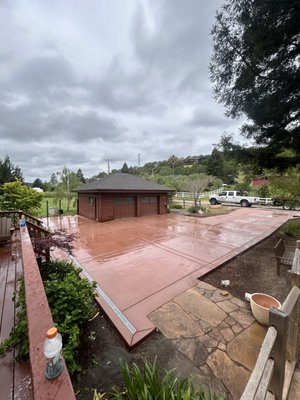 Novato Driveway - This beautiful pour was done in Novato, CA!
We laid down this sunset rose-colored, broom-finished concrete with a clean, consistent texture that really catches the light. We also installed a channel drain to ensure proper drainage and long-term durability. Novato Driveway - This beautiful pour was done in Novato, CA!
We laid down this sunset rose-colored, broom-finished concrete with a clean, consistent texture that really catches the light. We also installed a channel drain to ensure proper drainage and long-term durability.