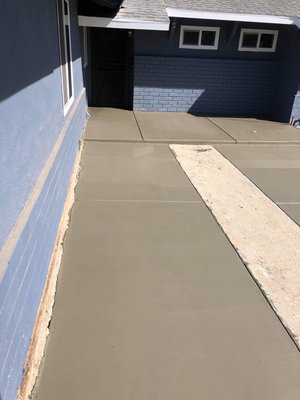 Concrete around the back and the front of the house - Concrete around the house