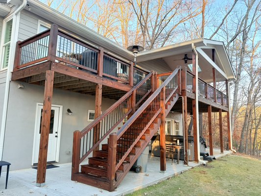 Stained deck - Started by deep-cleaning the deck with a professional wood cleaner to strip away dirt, mildew, and old residue. Followed with a brightener to restore the natural wood tone and open the grain for better stain absorption. Finished with a high-quality semi-transparent stain that enhances the wood’s natural beauty while adding long-lasting protection against weather and UV damage. Stained deck - Started by deep-cleaning the deck with a professional wood cleaner to strip away dirt, mildew, and old residue. Followed with a brightener to restore the natural wood tone and open the grain for better stain absorption. Finished with a high-quality semi-transparent stain that enhances the wood’s natural beauty while adding long-lasting protection against weather and UV damage.