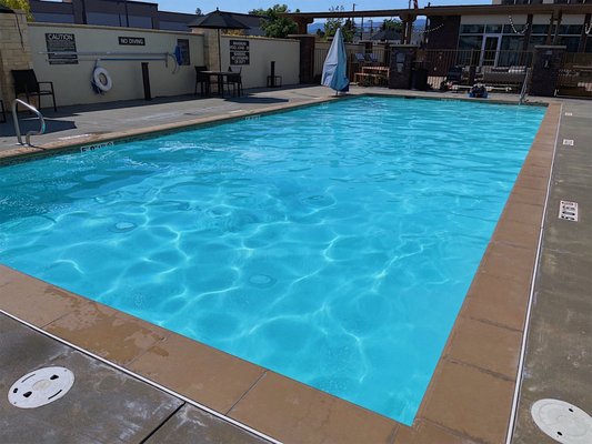 New Build: San Carlos, CA - This pool and spa was built by our team for a Marriott branch. This photo exemplifies not only our expertise in pool craft, but how every aspect is carefully thought about. We build pools with passion, as well as ensuring that all current pool codes are met with handicap lifts, life ropes, and appropriate signage. New Build: San Carlos, CA - This pool and spa was built by our team for a Marriott branch. This photo exemplifies not only our expertise in pool craft, but how every aspect is carefully thought about. We build pools with passion, as well as ensuring that all current pool codes are met with handicap lifts, life ropes, and appropriate signage.
