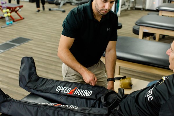 Recovery services - Recovery Services at Touchstone Physical Therapy & Wellness are designed to support healing, reduce soreness, and improve overall recovery between and during physical therapy sessions. We offer evidence-based modalities including compression therapy, electrical stimulation (e-stim), heat and ice therapy, and mechanical traction to help manage pain, decrease inflammation, improve circulation, and restore mobility.
These services are often used alongside hands-on treatment and therapeutic exercise to enhance recovery, promote tissue healing, and improve treatment outcomes. These services can also be purchased as a standalone treatment, as an individual or package deal
Our recovery services help patients feel better, move more comfortably, and stay consistent with their rehabilitation and activity goals. Recovery services - Recovery Services at Touchstone Physical Therapy & Wellness are designed to support healing, reduce soreness, and improve overall recovery between and during physical therapy sessions. We offer evidence-based modalities including compression therapy, electrical stimulation (e-stim), heat and ice therapy, and mechanical traction to help manage pain, decrease inflammation, improve circulation, and restore mobility.
These services are often used alongside hands-on treatment and therapeutic exercise to enhance recovery, promote tissue healing, and improve treatment outcomes. These services can also be purchased as a standalone treatment, as an individual or package deal
Our recovery services help patients feel better, move more comfortably, and stay consistent with their rehabilitation and activity goals.