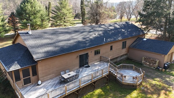 TitanXT Roof Replacement - Kreck Contracting recently completed the installation of Tamko Titan XT Rustic Black shingles on a charming country home. Known for their exceptional durability and timeless appeal, the Titan XT shingles enhance the home’s rustic charm while providing top-tier weather resistance. The bold black tones of the shingles perfectly complement the countryside setting, adding a sleek, modern edge to the traditional aesthetic. With Kreck Contracting’s commitment to precision and quality, this project showcases their expertise in roofing solutions tailored to both form and function. The result is a stunning, long-lasting roof that blends beauty and reliability.