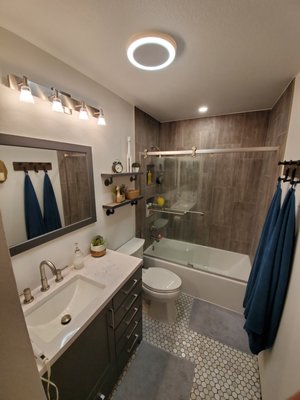 Bathroom Remodel - This was my first complete bathroom remodel. Demo, plumbing, tile, shower door, new vanity and fixtures. Bathroom Remodel - This was my first complete bathroom remodel. Demo, plumbing, tile, shower door, new vanity and fixtures.
