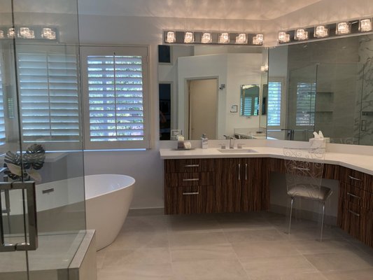 Northridge Bathroom Remodel - Elevated Craftsmanship in Every Detail — Northridge Bathroom Remodel
Step into this fully reimagined Northridge bathroom, where expert craftsmanship, precision installation, and high-performance materials come together to create a clean, modern space built to last. From custom tilework to a brand-new walk-in shower system, every element of this remodel reflects the attention to detail and quality execution we bring to every project.
Project Highlights:
Custom Tile Installation: Oversized format wall tile was meticulously installed with tight grout lines and seamless transitions to deliver a sleek, high-end look. Floor tile was selected for slip resistance and set with laser-level precision for long-term durability.
Stone & Surface Upgrades: Solid quartz countertops with a clean edge profile were fabricated and set on site, paired with a custom-cut quartz shower bench and niche ledges for a durable, integrated finish.
New Walk-In Shower System: We reconfigured the shower footprint to maximize usable space, then built out a fully waterproofed walk-in shower complete with frameless glass enclosure, custom-tiled niche, and upgraded linear drain.
Framing & Layout Adjustments: Strategic framing modifications allowed for improved sightlines and a more functional flow. We opened up wall space, re-centered plumbing, and relocated electrical for optimal lighting and utility.
Custom Cabinetry Installation: Professionally installed vanities feature soft-close hardware, ample storage, and clean-lined shaker doors—all finished on site to ensure a flawless, built-in appearance.
Lighting & Electrical Upgrades: New recessed lighting, mirror-mounted fixtures, and GFCI outlets were installed to code, offering safe, bright, and efficient operation throughout the space.
Quality You Can Feel: From underlayment to finish caulking, every phase of this project was executed by skilled tradespeople who understand that what’s behind the walls matters just as much as what you see.
This Northridge remodel reflects the kind of reliable, code-compliant, and visually refined bathroom renovation our team is proud to deliver—on time, on budget, and built to last.
Ready to start your bathroom transformation? Contact us today to schedule your free walkthrough and project estimate. Northridge Bathroom Remodel - Elevated Craftsmanship in Every Detail — Northridge Bathroom Remodel
Step into this fully reimagined Northridge bathroom, where expert craftsmanship, precision installation, and high-performance materials come together to create a clean, modern space built to last. From custom tilework to a brand-new walk-in shower system, every element of this remodel reflects the attention to detail and quality execution we bring to every project.
Project Highlights:
Custom Tile Installation: Oversized format wall tile was meticulously installed with tight grout lines and seamless transitions to deliver a sleek, high-end look. Floor tile was selected for slip resistance and set with laser-level precision for long-term durability.
Stone & Surface Upgrades: Solid quartz countertops with a clean edge profile were fabricated and set on site, paired with a custom-cut quartz shower bench and niche ledges for a durable, integrated finish.
New Walk-In Shower System: We reconfigured the shower footprint to maximize usable space, then built out a fully waterproofed walk-in shower complete with frameless glass enclosure, custom-tiled niche, and upgraded linear drain.
Framing & Layout Adjustments: Strategic framing modifications allowed for improved sightlines and a more functional flow. We opened up wall space, re-centered plumbing, and relocated electrical for optimal lighting and utility.
Custom Cabinetry Installation: Professionally installed vanities feature soft-close hardware, ample storage, and clean-lined shaker doors—all finished on site to ensure a flawless, built-in appearance.
Lighting & Electrical Upgrades: New recessed lighting, mirror-mounted fixtures, and GFCI outlets were installed to code, offering safe, bright, and efficient operation throughout the space.
Quality You Can Feel: From underlayment to finish caulking, every phase of this project was executed by skilled tradespeople who understand that what’s behind the walls matters just as much as what you see.
This Northridge remodel reflects the kind of reliable, code-compliant, and visually refined bathroom renovation our team is proud to deliver—on time, on budget, and built to last.
Ready to start your bathroom transformation? Contact us today to schedule your free walkthrough and project estimate.