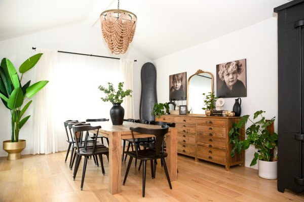 Kingston Dining Room - We transformed this cluttered, underused space into a clean, modern dining area designed for both style and functionality. By enhancing natural light, updating finishes, and redesigning the layout, the room now feels open, warm, and inviting.

Featuring light oak flooring, fresh interior paint, a custom dining setup, and curated décor, this space is now perfect for everyday living and entertaining.

From storage space to statement space, a complete transformation.