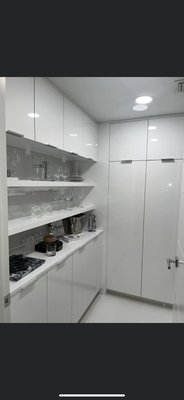 Jamie Condo Closet Remodel - Jamie was not exactly sure how she wanted her closet to look, so with our proper expertise, we were able to create a brand new closet with European frameless cabinets, which created a closet that she will never forget.