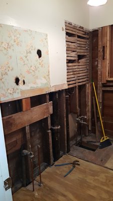 Bathroom remodel - This is a remodel of a 100 year home. We removed the old bathroom. Ran new plumbing drains and water lines. Installed new toilet, tub, and lavatory. New paint, tile and electrical. Customer is very happy.