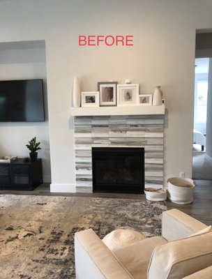 New fireplace design - Homeowner wanted a new contemporary design for the fireplace . So we demoed the tile , hung new drywall and metal trim around the fireplace and painted to give a smooth and not as busy look to this fireplace. New fireplace design - Homeowner wanted a new contemporary design for the fireplace . So we demoed the tile , hung new drywall and metal trim around the fireplace and painted to give a smooth and not as busy look to this fireplace.