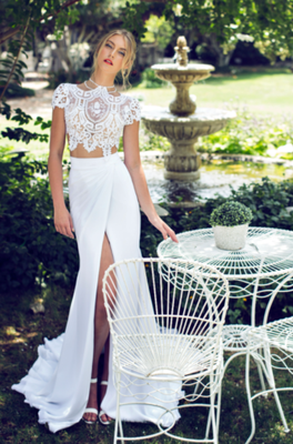 Riki Dalal - The Riki Dalal bride is modern, refined, and the epitome of elegance. The collections are inspired by timeless femininity and highlight women’s silhouettes and beauty through unique designs and luxurious materials. Riki Dalal’s dresses showcase gowns full of life and extraordinary quality. Each dress is designed and tailored to brides searching for classic beauty with modern and visual appeal.