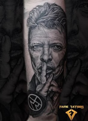 Portrait Tattoos - Portrait Tattoos are especially intricate and Detailed, and not every Tattoo Artist is up to the challenge. But luckily, with the passionate Tattoo Artists from Fame Tattoos on your side, you’ll get the High-Quality Portrait Tattoo you’ve been dreaming about. Our Tattoo Artists have done many Portrait Tattoos over the years, and in this Portfolio, you can see for yourself just how talented they are.
Portrait tattoos are very special. They always have a deep and personal meaning.
Some portrait tattoos commemorate a passed loved one. Some celebrate the love a parent has for their child. Some are of cherished pets. No matter what yours means to you, you need a good artist to accurately capture the likeness and create the special tattoo you have dreamed about.
We have created many beautiful portrait tattoos over the years, capturing the spirit of loved ones and immortalizing them in ink.
We do portraits in black and white, grey, or color. We capture the dimples of your baby’s smile, the laugh lines that made Grandma special, the warmth in your loved one’s eyes and more. How about portrait backgrounds depicting a special vacation, pet, or object? Our backgrounds are every bit as impressive as the portrait itself.
Never take chances when it comes to portrait tattoos. Fame Tattoos has the best portrait tattoo artists in Miami that are ready to bring your cherished memories to life. Contact us today to schedule your appointment! Portrait Tattoos - Portrait Tattoos are especially intricate and Detailed, and not every Tattoo Artist is up to the challenge. But luckily, with the passionate Tattoo Artists from Fame Tattoos on your side, you’ll get the High-Quality Portrait Tattoo you’ve been dreaming about. Our Tattoo Artists have done many Portrait Tattoos over the years, and in this Portfolio, you can see for yourself just how talented they are.
Portrait tattoos are very special. They always have a deep and personal meaning.
Some portrait tattoos commemorate a passed loved one. Some celebrate the love a parent has for their child. Some are of cherished pets. No matter what yours means to you, you need a good artist to accurately capture the likeness and create the special tattoo you have dreamed about.
We have created many beautiful portrait tattoos over the years, capturing the spirit of loved ones and immortalizing them in ink.
We do portraits in black and white, grey, or color. We capture the dimples of your baby’s smile, the laugh lines that made Grandma special, the warmth in your loved one’s eyes and more. How about portrait backgrounds depicting a special vacation, pet, or object? Our backgrounds are every bit as impressive as the portrait itself.
Never take chances when it comes to portrait tattoos. Fame Tattoos has the best portrait tattoo artists in Miami that are ready to bring your cherished memories to life. Contact us today to schedule your appointment!