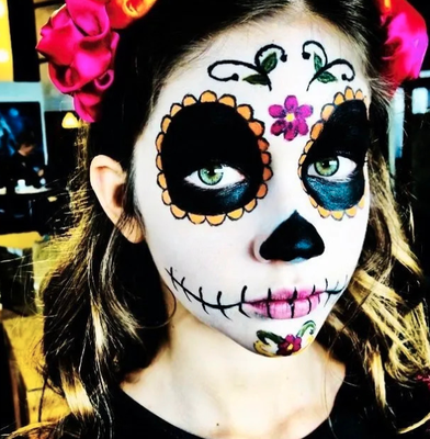 Halloween Makeup - Day Of The Dead also known as Dia De Los Muertos is celebrated in October with skull and beautiful sugar skull makeup themes. This makeup is also worn for Halloween.

Skull Makeup also shown here.