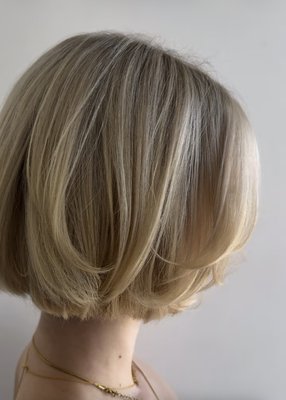 Full Highlights - Full blonde highlights customized to lift dark and box-colored hair safely. This service included a color remover to eliminate previous pigment, followed by precision highlights and toning to achieve a bright, even blonde while maintaining hair health and integrity. Ideal for clients transitioning to blonde who want professional results with minimal damage.