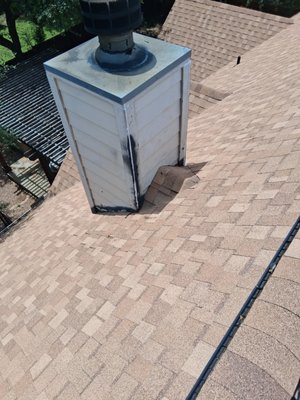 custom chimney cricket installation - built and installed a custom chimney cricket to improve water drainage and prevent leaks behind the chimney area custom chimney cricket installation - built and installed a custom chimney cricket to improve water drainage and prevent leaks behind the chimney area