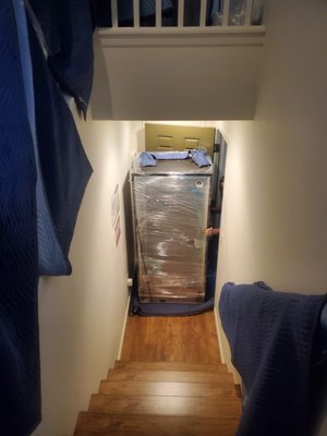 Large and Heavy Item Moving - Large two-door refrigerator was moved up to the second floor through a narrow staircase in the townhouse. Large and Heavy Item Moving - Large two-door refrigerator was moved up to the second floor through a narrow staircase in the townhouse.