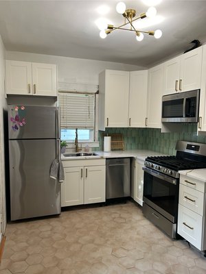 Kitchen Renovation - This crammed kitchen quickly opened up and turned into an inviting place to cook. Something that is not shown in the picture is the new island we installed where the old living room/kitchen wall was. The customer couldn’t have been happier with our timeline and hardwork. Kitchen Renovation - This crammed kitchen quickly opened up and turned into an inviting place to cook. Something that is not shown in the picture is the new island we installed where the old living room/kitchen wall was. The customer couldn’t have been happier with our timeline and hardwork.