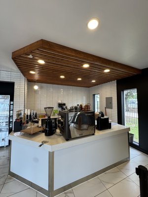 Coffee Shop - A local church reached out with a tight deadline to add a small coffee shop. The church wanted the coffee shop to be completed within 1 week so it would be operable by Easter Sunday. We were not only able to successfully execute their vision, but exceed their deadline expectations by completing their floor, backsplash, and accent wall within 2 days. Coffee Shop - A local church reached out with a tight deadline to add a small coffee shop. The church wanted the coffee shop to be completed within 1 week so it would be operable by Easter Sunday. We were not only able to successfully execute their vision, but exceed their deadline expectations by completing their floor, backsplash, and accent wall within 2 days.