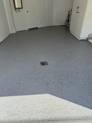 “Shale” color from our stone flake collection. - This garage floor in San Francisco needed a lot of prep work due to moisture coming through the slab and several cracks, holes in the concrete. After grinding, repairing, and prepping the entire floor, we applied a moisture vapor barrier primer to help ensure a long-lasting coating system.
The customer chose our Shale flake blend, and the finished floor came out great. “Shale” color from our stone flake collection. - This garage floor in San Francisco needed a lot of prep work due to moisture coming through the slab and several cracks, holes in the concrete. After grinding, repairing, and prepping the entire floor, we applied a moisture vapor barrier primer to help ensure a long-lasting coating system.
The customer chose our Shale flake blend, and the finished floor came out great.