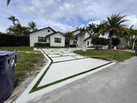 Driveway Painting - Painting a driveway protects it from wear, stains, and weather damage, helping it last longer. It also improves curb appeal by giving the driveway a clean, polished look that complements the home. Additionally, a painted surface can make the driveway easier to clean and maintain over time.