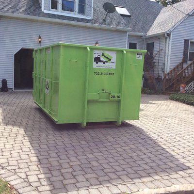 20 Yard Dumpster - Our 20 yard dumpster fits in a single parking spot. It is 11'long, 8'wide, and 6'high. It has double entry opening doors in the rear. We place it on driveway protection boards so it never touches your driveway. 20 Yard Dumpster - Our 20 yard dumpster fits in a single parking spot. It is 11'long, 8'wide, and 6'high. It has double entry opening doors in the rear. We place it on driveway protection boards so it never touches your driveway.
