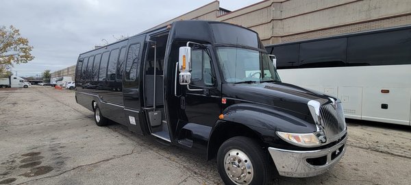 Party Bus - Our 26-Passenger Party Bus is perfect for larger groups looking to travel together comfortably and conveniently. Ideal for concerts, sporting events, weddings, social dinners, corporate events, group outings, and special occasions throughout Chicago. Enjoy spacious group transportation with a professional chauffeur, making your celebration or event enjoyable from pickup to destination. Party Bus - Our 26-Passenger Party Bus is perfect for larger groups looking to travel together comfortably and conveniently. Ideal for concerts, sporting events, weddings, social dinners, corporate events, group outings, and special occasions throughout Chicago. Enjoy spacious group transportation with a professional chauffeur, making your celebration or event enjoyable from pickup to destination.