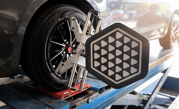 Wheel Alignment - The Basic Facts You Need
Wheel alignment refers to proper adjustment of the major suspension angles called the camber, caster, toe, and thrust. These represent the complex set of relationships between your auto body, axles, wheels, and the road surface. When the angles are appropriately adjusted, you have more control over your vehicle. Traction is maximized because the tires make the most possible contact with the pavement, and wear on other components is minimized. Over time, in the event of a crash, or through contact with major bumps or holes, the wheel alignment can become skewed. Therefore, it’s a good idea to have us check the alignment periodically. Most agree that should be about once per year and when you purchase a new set of tires. However, there are some signs you may notice that should prompt you to schedule a wheel alignment sooner. One of the most frequently noticed manifestations is uneven tire wear. When your tires are worn significantly more in some areas than others, it’s an almost certain sign of poor wheel alignment. You may also feel your automobile pulling to one side as you try to drive straight ahead. Other signals can include a high pitched noise emitting from the tires and a steering wheel that won’t return to center position. Wheel Alignment - The Basic Facts You Need
Wheel alignment refers to proper adjustment of the major suspension angles called the camber, caster, toe, and thrust. These represent the complex set of relationships between your auto body, axles, wheels, and the road surface. When the angles are appropriately adjusted, you have more control over your vehicle. Traction is maximized because the tires make the most possible contact with the pavement, and wear on other components is minimized. Over time, in the event of a crash, or through contact with major bumps or holes, the wheel alignment can become skewed. Therefore, it’s a good idea to have us check the alignment periodically. Most agree that should be about once per year and when you purchase a new set of tires. However, there are some signs you may notice that should prompt you to schedule a wheel alignment sooner. One of the most frequently noticed manifestations is uneven tire wear. When your tires are worn significantly more in some areas than others, it’s an almost certain sign of poor wheel alignment. You may also feel your automobile pulling to one side as you try to drive straight ahead. Other signals can include a high pitched noise emitting from the tires and a steering wheel that won’t return to center position.