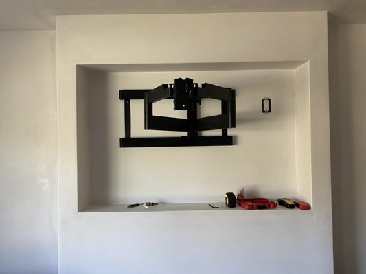 Tv wall mount installation - This was a full motion tv bracket installation on a plaster wall. The opening was built to fit this tv perfectly with very little gaps. A Sony speaker was also connected to this tv. Tv wall mount installation - This was a full motion tv bracket installation on a plaster wall. The opening was built to fit this tv perfectly with very little gaps. A Sony speaker was also connected to this tv.