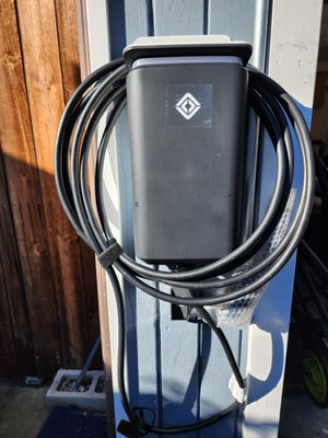 EV charger installation. - The Rivian charger installation was completed successfully, providing a secure and efficient charging solution. Our team ensured proper setup, testing, and functionality, delivering a seamless experience for reliable EV charging.