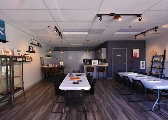 Community Center - Commercial Design - We took a raw space and added a custom kitchen, flooring throughout, display areas, hidden storage cabinetry, an ADA bathroom and high contrast lighting. We designed this to be a convertible space for community meetings and social gatherings. Community Center - Commercial Design - We took a raw space and added a custom kitchen, flooring throughout, display areas, hidden storage cabinetry, an ADA bathroom and high contrast lighting. We designed this to be a convertible space for community meetings and social gatherings.