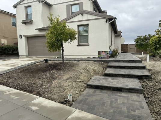 LR Pavers - This was a front entrance remodel.
We added the steps and the driveway extension as well as the side yard wall. Design is close to original. LR Pavers - This was a front entrance remodel.
We added the steps and the driveway extension as well as the side yard wall. Design is close to original.