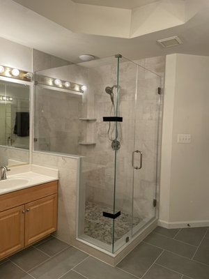 Bathroom Remodel in South Riding, VA - This remodel brought a modern, refreshed look to the bathroom, and we're thrilled with the outcome. We hope this transformation inspires others looking to update their spaces!
For this bathroom remodel, our client wanted a complete transformation of their outdated space while preserving key features to keep within budget.
Also we discovered extensive water damage behind the old shower, including rot in the subfloor. To ensure a solid foundation, we removed and replaced the damaged subfloor under the shower area.
The client opted to keep both existing vanities and update just the fixtures, so we carefully worked around these pieces, replacing the tub and vanity faucets with new, modern fixtures. With careful planning, we crafted a beautiful, new shower—complete with fresh tile that flows seamlessly throughout the shower, tub, and bathroom floor. We also installed new baseboards and replaced the toilet to complete the updated look.