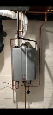 Hot water heater replacement with tank less - We removed an old power vent water heater and replaced it with a tank less hot water heater Hot water heater replacement with tank less - We removed an old power vent water heater and replaced it with a tank less hot water heater