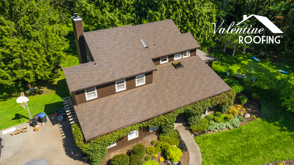 New Roof in Bainbridge Island - This Kitsap County home required a new roofing system featuring shingles with an excellent wind warranty so we chose the Duration Flex shingle. All the skylights were replaced with energy-efficient, locally manufactured glass skylights. New gutters were custom fit on site for a seamless look and perfect installation. New Roof in Bainbridge Island - This Kitsap County home required a new roofing system featuring shingles with an excellent wind warranty so we chose the Duration Flex shingle. All the skylights were replaced with energy-efficient, locally manufactured glass skylights. New gutters were custom fit on site for a seamless look and perfect installation.