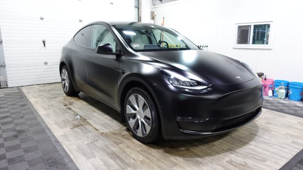 Tesla Model Y Satin Paint Protection Wrap - This Tesla Model Y wanted long lasting paint protection with an aggressive and unique look. We chose STEK DynoMatt for a Matte/Satin finish and a 10 year warranty.