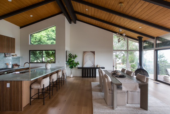 La Portada - A warm, architectural home defined by natural wood, clean lines, and strong indoor-outdoor connections. Vaulted ceilings and exposed beams create volume and character, while large openings invite light and landscape into the living experience.
Blending structure with comfort, each space feels grounded, open, and deeply connected to its surroundings—offering a refined yet relaxed way of living. La Portada - A warm, architectural home defined by natural wood, clean lines, and strong indoor-outdoor connections. Vaulted ceilings and exposed beams create volume and character, while large openings invite light and landscape into the living experience.
Blending structure with comfort, each space feels grounded, open, and deeply connected to its surroundings—offering a refined yet relaxed way of living.