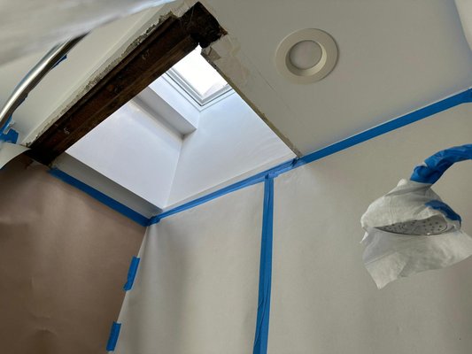 Water Damage Ceiling Repair & Drywall Restoration - Water damage around a skylight caused deterioration of drywall and framing. The damaged ceiling section was carefully opened, inspected, and prepped for repair. After addressing the affected area, new drywall was installed, properly finished, textured, and painted to match the existing ceiling. The result is a clean, seamless finish with restored structure and no visible signs of previous damage.