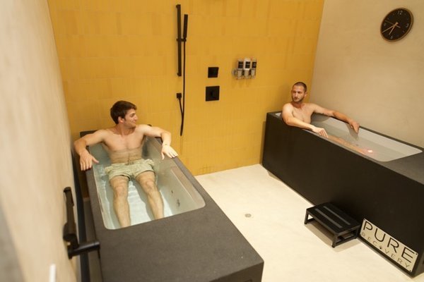 Cold Plunges - Outside of our contrast rooms, Pure Recovery features a Plunge Room with two plunges in one space, allowing you to compete with friends or family. This invigorating setup enhances circulation, reduces muscle soreness, and accelerates recovery. Book now and experience the revitalizing effects together! Cold Plunges - Outside of our contrast rooms, Pure Recovery features a Plunge Room with two plunges in one space, allowing you to compete with friends or family. This invigorating setup enhances circulation, reduces muscle soreness, and accelerates recovery. Book now and experience the revitalizing effects together!