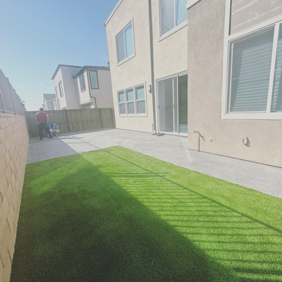 Town Home- HOA Community - Within the townhome's confines, Agui's Concrete crafted a refined concrete patio. Adorned with verdant artificial turf, it formed a lively, contrasting patch. This seamless integration of durable concrete and vibrant turf created a tranquil urban haven, a serene spot for relaxation amidst the bustling cityscape. Town Home- HOA Community - Within the townhome's confines, Agui's Concrete crafted a refined concrete patio. Adorned with verdant artificial turf, it formed a lively, contrasting patch. This seamless integration of durable concrete and vibrant turf created a tranquil urban haven, a serene spot for relaxation amidst the bustling cityscape.