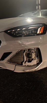 Audi front bumper crack repair - This repair was done after the customer ran over an object on the road and cracked the bottom of the front bumper on the Audi. Audi front bumper crack repair - This repair was done after the customer ran over an object on the road and cracked the bottom of the front bumper on the Audi.