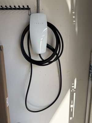 Installing Tesla Universal Wall Connector - Megawire Electric installed a Tesla Universal Wall Connector in this customer’s garage for convenient home EV charging. We ran the electrical wiring through securely mounted metal conduit, mounted and connected the charger, and verified power at the unit. The finished installation provides a convenient charging location for both Tesla vehicles and other compatible EVs. Installing Tesla Universal Wall Connector - Megawire Electric installed a Tesla Universal Wall Connector in this customer’s garage for convenient home EV charging. We ran the electrical wiring through securely mounted metal conduit, mounted and connected the charger, and verified power at the unit. The finished installation provides a convenient charging location for both Tesla vehicles and other compatible EVs.