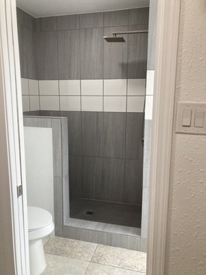 Bathroom Remodel - This shower was our second restroom remodeled for this client. They had their secondary shower done first then we came back to take on their master shower. Client wanted to convert tub into walk-in shower as well as remove double vanity to make room for a larger closet space.