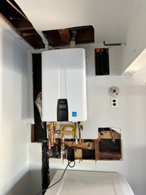 Tankless Water Heater Installations - Our team recently installed new Navien tankless water heaters, providing our customer with endless hot water, increased energy efficiency, and more space-saving convenience. Navien is known for its high-performance, energy-efficient design, offering on-demand hot water while using less gas and water compared to traditional tanks. These systems include smart digital controls, built-in recirculation features for faster hot water delivery, and durable stainless-steel heat exchangers that ensure long-lasting performance. With a Navien tankless system, homeowners enjoy consistent water temperature, lower utility bills, and the peace of mind that comes from one of the most reliable brands in the industry; all professionally installed by the Simpex Repipe & Plumbing team. Tankless Water Heater Installations - Our team recently installed new Navien tankless water heaters, providing our customer with endless hot water, increased energy efficiency, and more space-saving convenience. Navien is known for its high-performance, energy-efficient design, offering on-demand hot water while using less gas and water compared to traditional tanks. These systems include smart digital controls, built-in recirculation features for faster hot water delivery, and durable stainless-steel heat exchangers that ensure long-lasting performance. With a Navien tankless system, homeowners enjoy consistent water temperature, lower utility bills, and the peace of mind that comes from one of the most reliable brands in the industry; all professionally installed by the Simpex Repipe & Plumbing team.