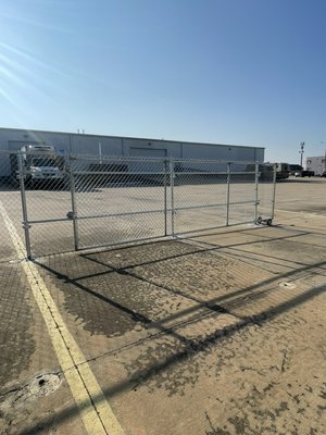 6’ chain link fence - This job was for a commercial property. To section off a part of the park lot. I did (3) sliding gates on a track with wheels. 6’ chain link fence - This job was for a commercial property. To section off a part of the park lot. I did (3) sliding gates on a track with wheels.