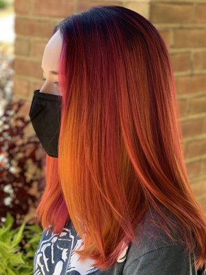 Vivids (unicorn hair) - These hair colors were made by carefully pre lightening the hair first. Then we apply the custom blended colors through the hair.