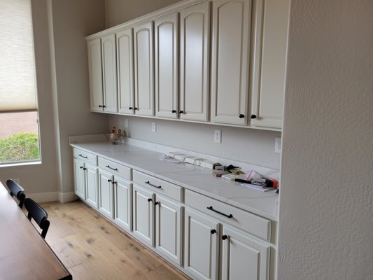 Cabinet painting - We refinished these cabinets in Anthem. The kitchen, hall, laundry, and all the bathrooms were included. 140 pieces in total! The color is SW Alabaster. Cabinet painting - We refinished these cabinets in Anthem. The kitchen, hall, laundry, and all the bathrooms were included. 140 pieces in total! The color is SW Alabaster.