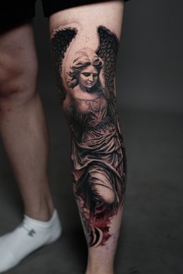 Angel Tattoos - Our classical angel tattoos with dark realism and powerful emotion. We are focus on depth, movement, and light to create timeless black & grey tattoos that feel alive on the skin. Every angel tells a story of faith, struggle, strength, and redemption—made to age beautifully and carry meaning for a lifetime.