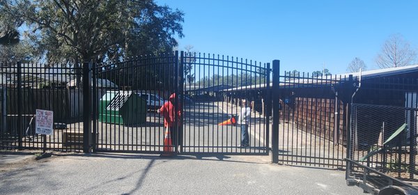 Modern Black Aluminum/ Steel Fencing - Designed for both security and sophistication, the "Ironclad Gate Series" features black aluminum fencing with sleek lines and precision-welded gates. Modern Black Aluminum/ Steel Fencing - Designed for both security and sophistication, the "Ironclad Gate Series" features black aluminum fencing with sleek lines and precision-welded gates.