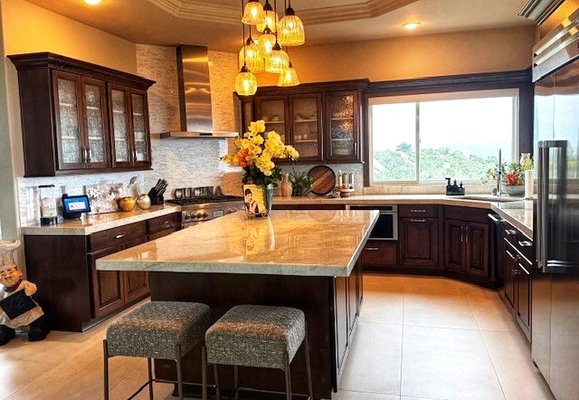 Crafting the Kitchen of Your Dreams! - So, you’ve decided it’s time to transform your kitchen with Cabinet Refacing. While your first thoughts likely turn to a fresh palette of colors, rich wood stains, or new door styles, Pacific Kitchens offers much more than a cosmetic update.
Beyond our vast selection of finishes, we specialize in cabinet modifications and smart storage solutions. We believe your kitchen should be as functional as it is beautiful. Whether you need to resize cabinetry for a new, larger appliance, modify the size of an island, or optimize storage space in your cabinets, our experienced refacing craftsmen integrate modern utility into your design.
Consider these functional upgrades for your project:
• Island Enhancements: Modifying the size or aesthetic of your kitchen island.
• Specialized Storage: Adding built-in beverage coolers, coffee stations, or custom pull-outs for
spices, cookie sheets, and trash receptacles.
• Enhanced Accessibility: Replacing deep lower cabinets with smooth-glide drawers or corner
organizers ('Lazy Susans') for effortless access.
• Expanded Capacity: Building a pantry or adding cabinetry to previously unused spaces.
• Design Focal Points: Incorporating glass-panel doors or sleek floating shelves.
At Pacific Kitchens, we help you craft the kitchen of your dreams, seamlessly blending smart storage with stunning style. Call us today to schedule your free in-home estimate for Custom Cabinet Refacing Tailored to You and get 20% off of your entire refacing project. Crafting the Kitchen of Your Dreams! - So, you’ve decided it’s time to transform your kitchen with Cabinet Refacing. While your first thoughts likely turn to a fresh palette of colors, rich wood stains, or new door styles, Pacific Kitchens offers much more than a cosmetic update.
Beyond our vast selection of finishes, we specialize in cabinet modifications and smart storage solutions. We believe your kitchen should be as functional as it is beautiful. Whether you need to resize cabinetry for a new, larger appliance, modify the size of an island, or optimize storage space in your cabinets, our experienced refacing craftsmen integrate modern utility into your design.
Consider these functional upgrades for your project:
• Island Enhancements: Modifying the size or aesthetic of your kitchen island.
• Specialized Storage: Adding built-in beverage coolers, coffee stations, or custom pull-outs for
spices, cookie sheets, and trash receptacles.
• Enhanced Accessibility: Replacing deep lower cabinets with smooth-glide drawers or corner
organizers ('Lazy Susans') for effortless access.
• Expanded Capacity: Building a pantry or adding cabinetry to previously unused spaces.
• Design Focal Points: Incorporating glass-panel doors or sleek floating shelves.
At Pacific Kitchens, we help you craft the kitchen of your dreams, seamlessly blending smart storage with stunning style. Call us today to schedule your free in-home estimate for Custom Cabinet Refacing Tailored to You and get 20% off of your entire refacing project.