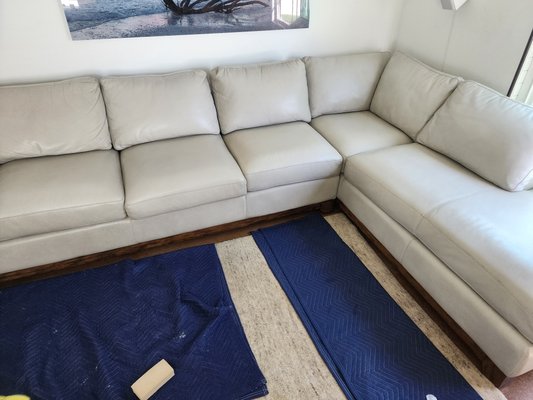 Leather Sofa Clean and Conditioning - This 12' white leather sofa needed some extra effort to get back to its former glory.
We ended up going over each cushion around 3-6 times to get all the oil out of it.
After cleaning, we applied a conditioning agent to give it a good smell and softness that also protects from future spills. Leather Sofa Clean and Conditioning - This 12' white leather sofa needed some extra effort to get back to its former glory.
We ended up going over each cushion around 3-6 times to get all the oil out of it.
After cleaning, we applied a conditioning agent to give it a good smell and softness that also protects from future spills.