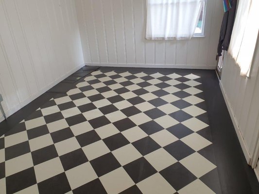 Classic Checkerboard Marmoleum Floor Installation - San Jose Kitchen Nook - Checkerboard flooring has recently made a big comeback! One of our latest projects was installing this beautiful 10"x10" marmoleum floor in the kitchen nook of a San Jose home.